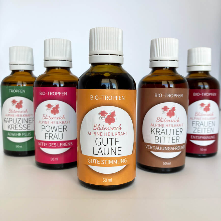 Gute Laune Bio-Tropfen im Vordergrund umgeben von anderen Bio-Tropfen für andere Anwendungszwecke.